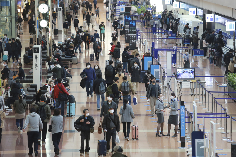 AP Un nouveau variant a été détecté chez quatre voyageurs brésiliens qui sont arrivés à l’aéroport Haneda de Tokyo le 2 janvier